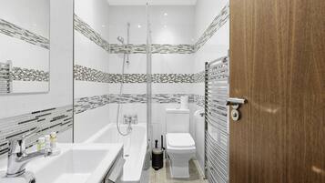 Hair dryer, towels, soap, shampoo