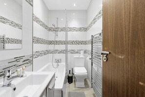 Hair dryer, towels, soap, shampoo