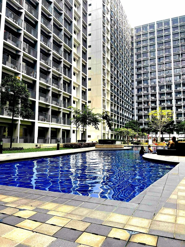 2 outdoor pools, open 6:00 AM to 10:00 PM, pool umbrellas, sun loungers