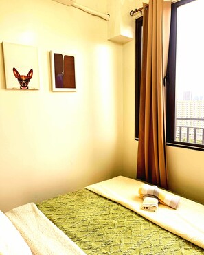 Standard Condo, 1 Bedroom, Balcony, City View | Individually furnished, blackout drapes, iron/ironing board, free WiFi - Casa Felice at Shore 2 Residences (Pasay)