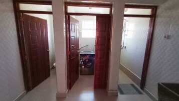 Family Apartment, City View | Bathroom | Shower, slippers, towels, soap