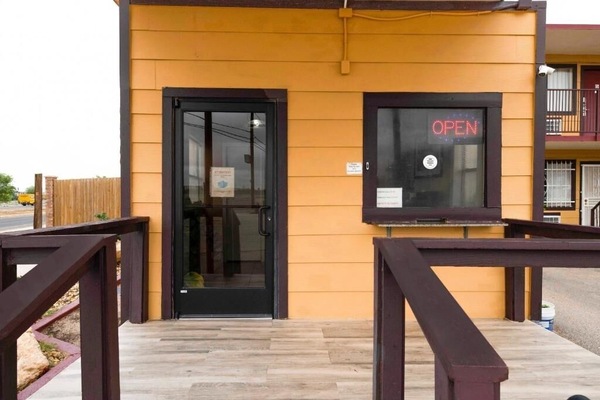Arrive effortlessly at the easy-access entrance and covered ramp.