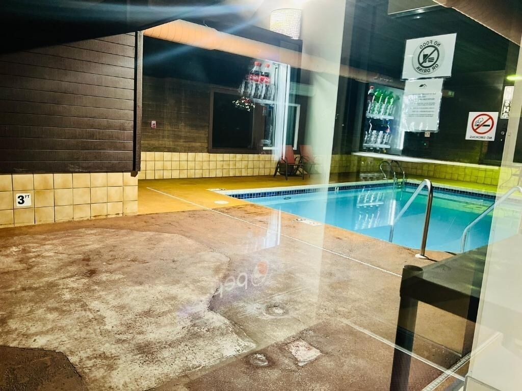 Recharge after travel with a peaceful indoor pool dip.