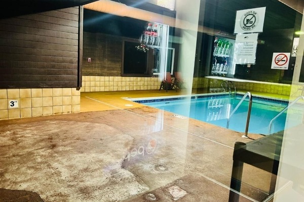 Recharge after travel with a peaceful indoor pool dip.