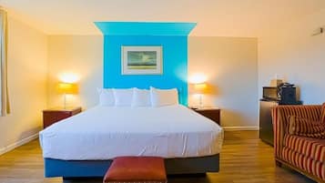 Tabla de planchar con plancha, wifi gratis y ropa de cama