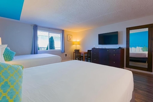 Recharge in comfort with TV entertainment and easy unpacking space.
