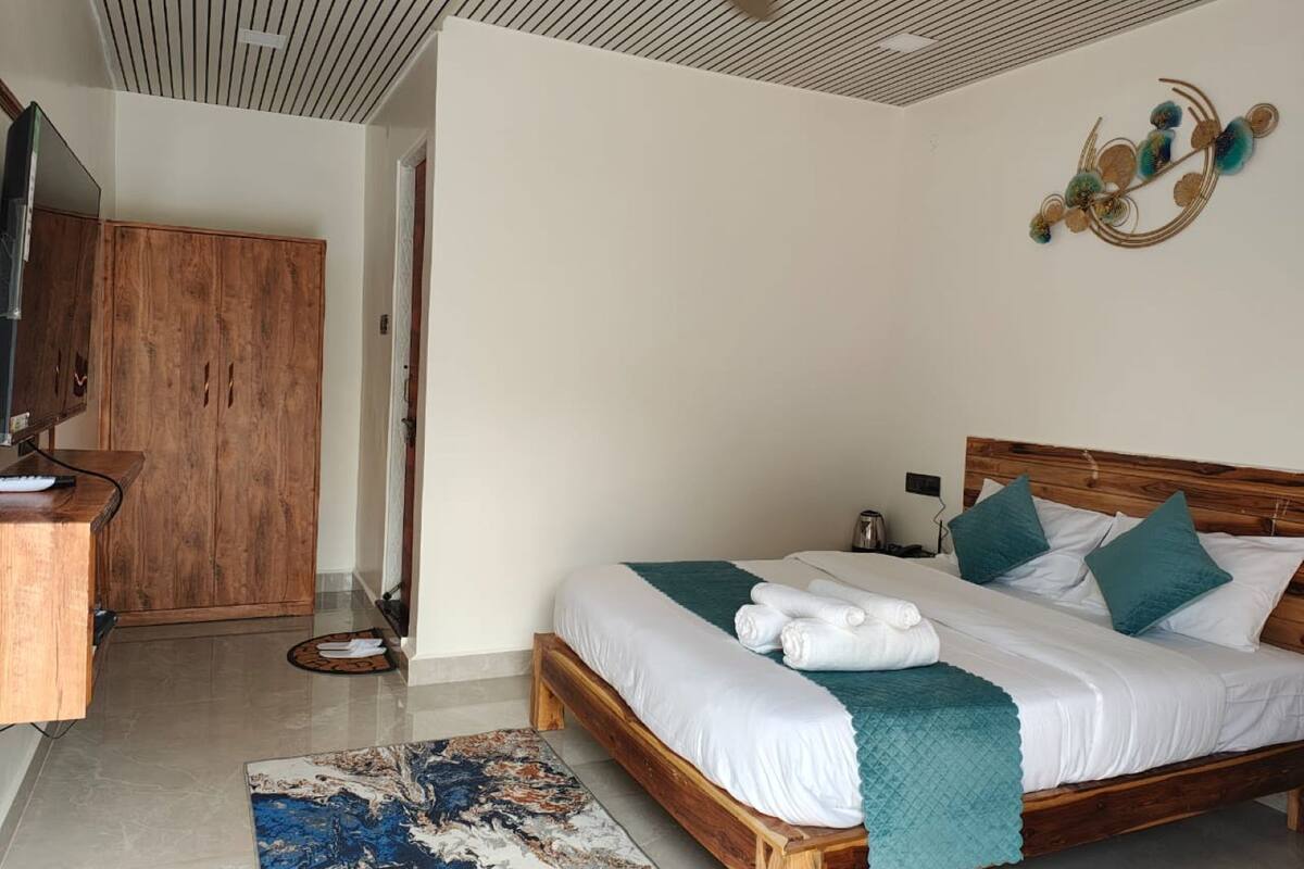 Deluxe Room, Air conditioning | Desk, laptop workspace, free WiFi