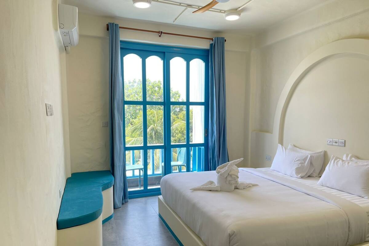 Deluxe Double Room, Balcony, City View | In-room safe, iron/ironing board, free WiFi