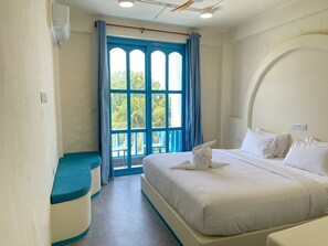 Premium bedding, memory-foam beds, minibar, in-room safe