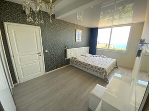 1 غرفة نوم ومكواة/لوح كي وواي فاي وملاءات أسرّة