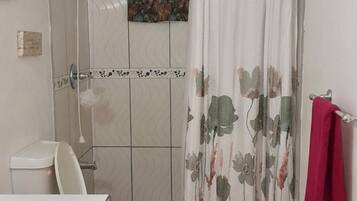 Shower, towels, soap, shampoo