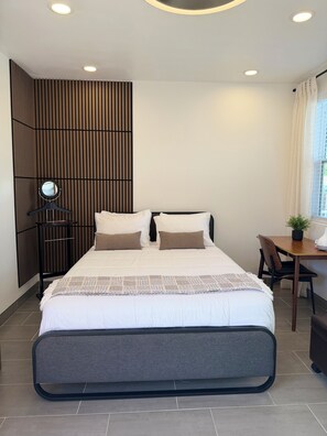 1 habitación, tabla de planchar con plancha, wifi y ropa de cama 