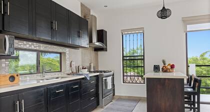 3 story home with exceptional views of the breaking surf and expansive mangroves