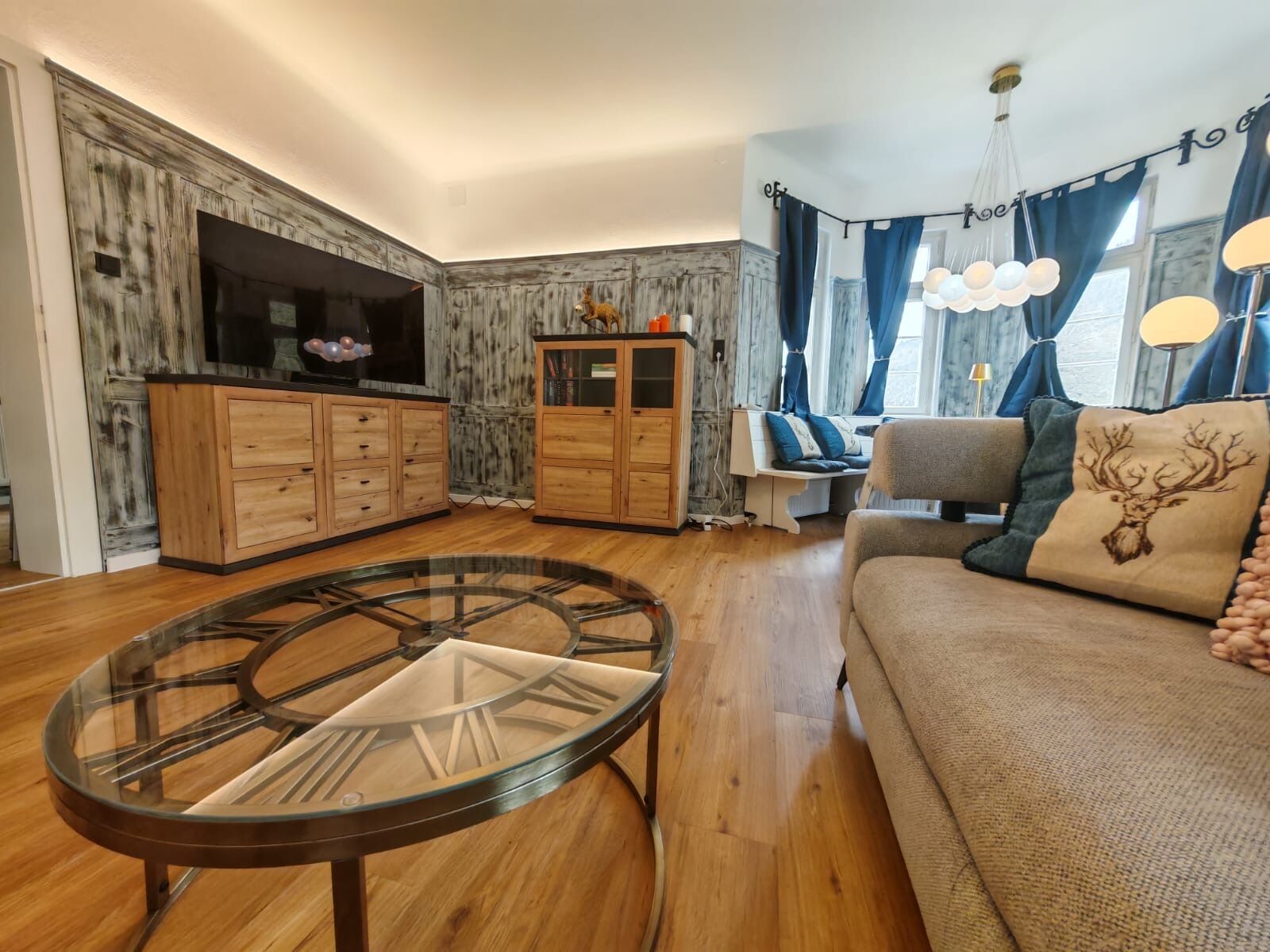 Smart TV, fireplace, books, printers