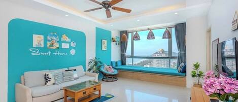 Smart TV, fireplace, books