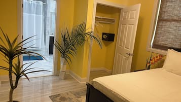 Deluxe Suite, Pool View | In-room safe, desk, free WiFi