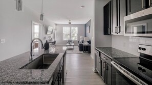 Fridge, dining tables - Landing | Chic 1BD, Gym, Pool (Summerville)