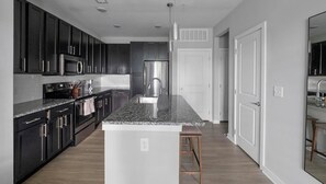 Fridge, dining tables - Landing | Stunning 1BD, Gym, Pool (Summerville)