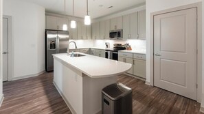 Fridge, dining tables - Landing | Stunning 2BD, Game Room, Pool (North Myrtle Beach)