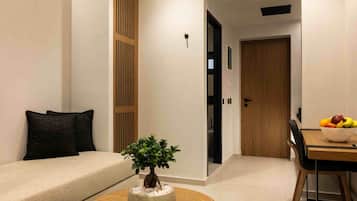 Superior Triple Room, City View | In-room safe, desk, laptop workspace, blackout drapes
