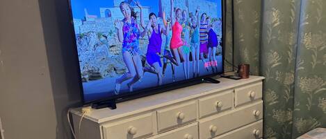 Blackout drapes, soundproofing, iron/ironing board