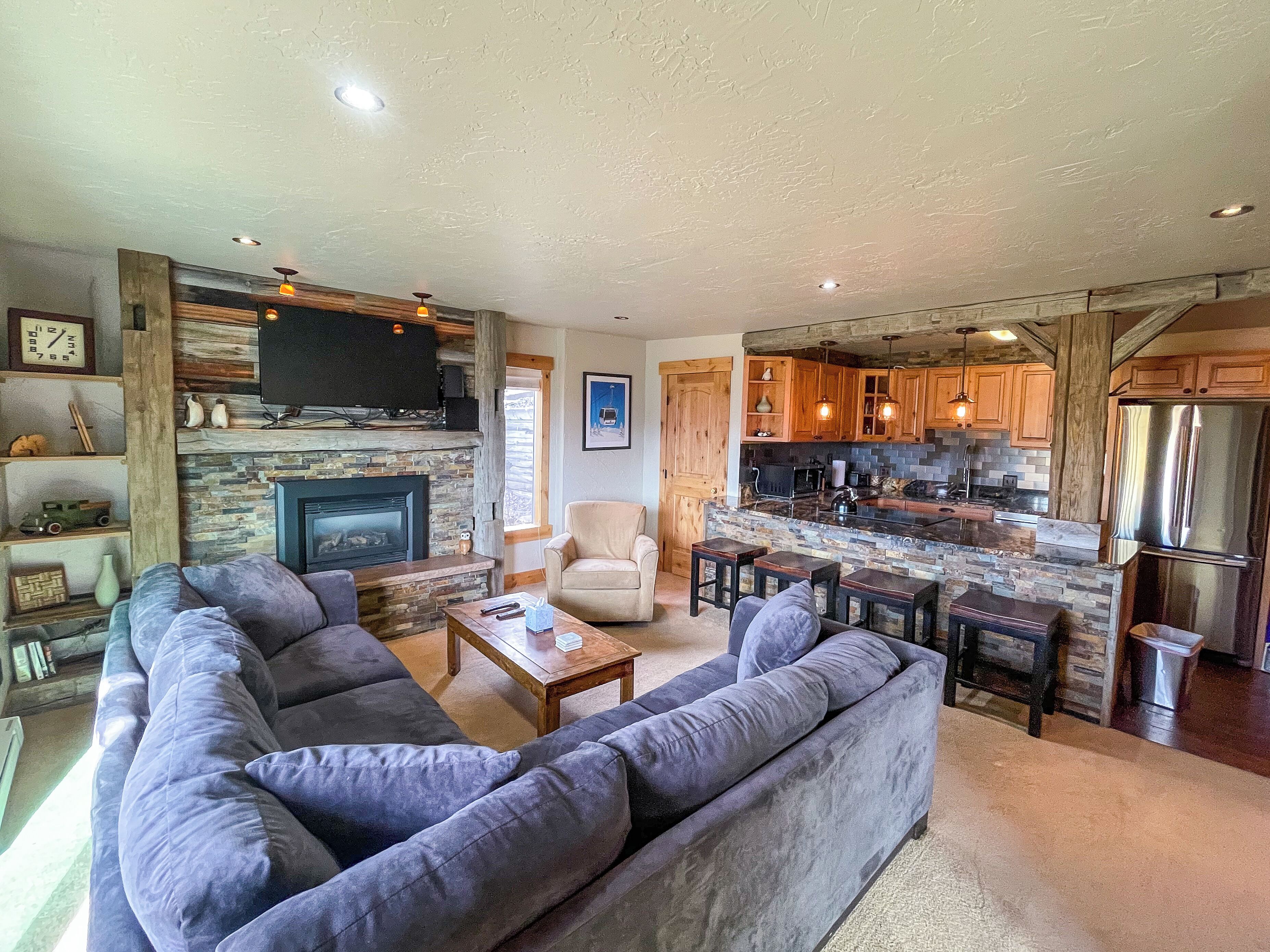 Comfortable living room with open flow to kitchen