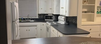 Beautifully restored, fully furnished 3 bedroom home one block from downtown