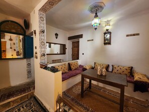 Deluxe House, City View | Living area | 54-inch Smart TV with satellite channels, video game console, toys