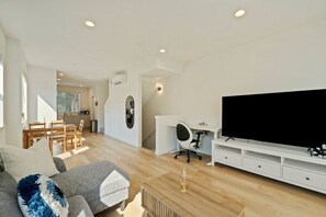 TV - Bright 2BR Townhome | Easy Access to Downtown & UW (Seattle)