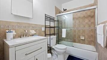 Hair dryer, towels, soap, toilet paper