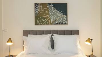 Iron/ironing board, travel crib, free WiFi, bed sheets