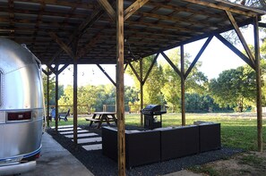 Outdoor dining - Riverside Retreat in Restored Airstream (Bastrop)
