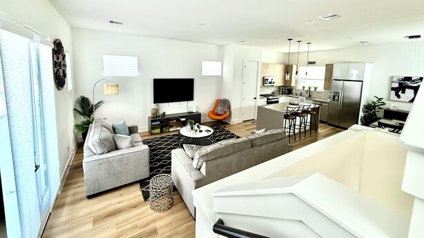 A modern apartment with a living room, kitchen, and dining area. - The Pearl, 3 bedrooms townhouse, Medical Center (Houston)