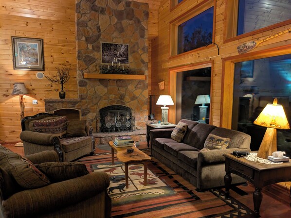 Smart TV, fireplace, books, stereo