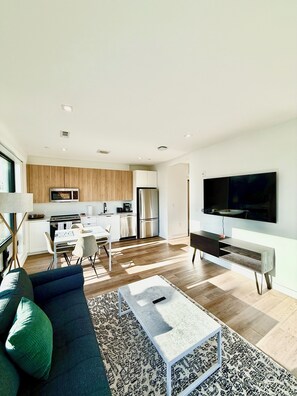 TV - Luxury 1BR with Rooftop • 5 min to Logan Airport (Boston)