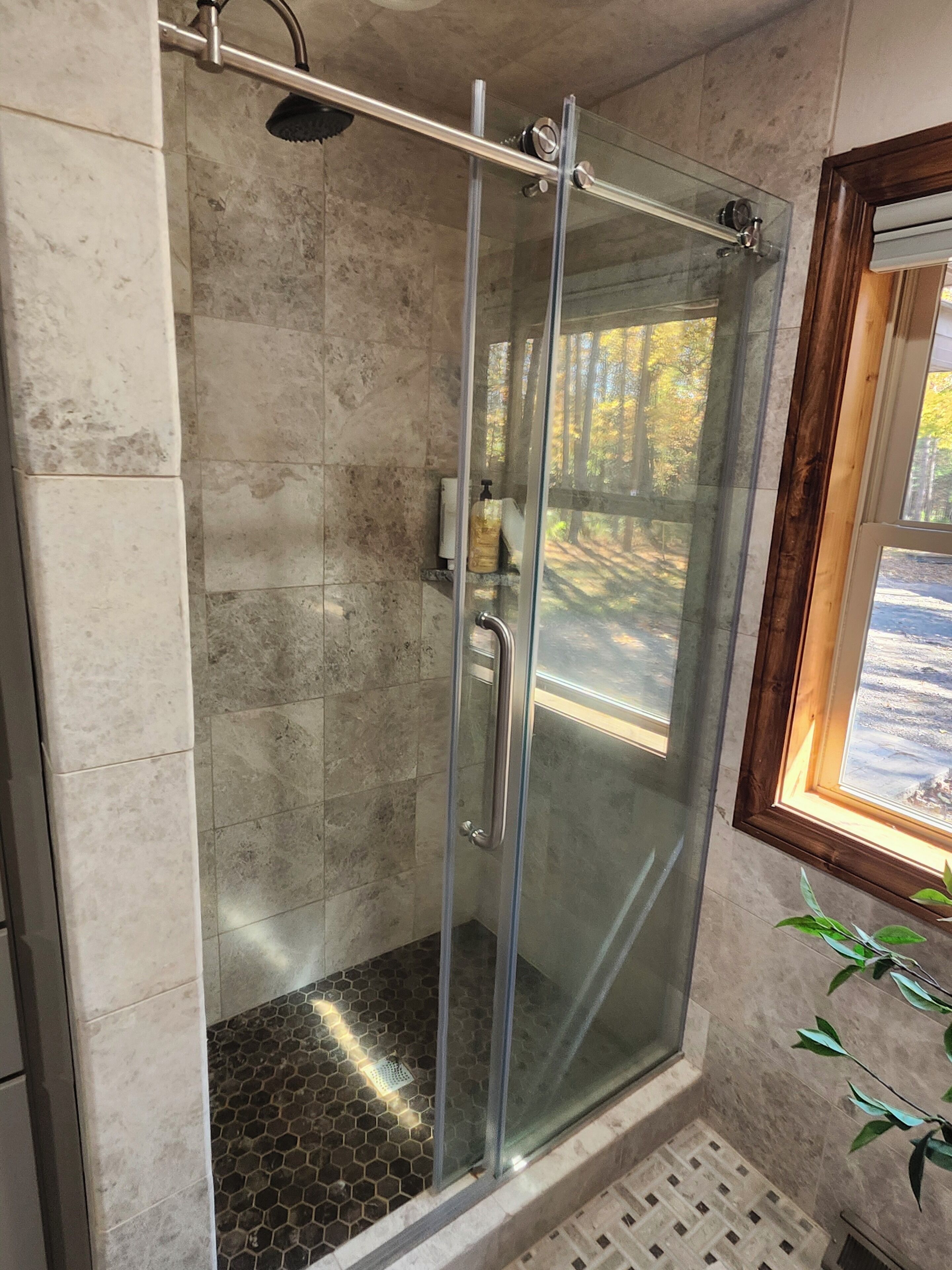 Shower, towels, soap, toilet paper