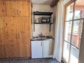 Fridge, microwave, cookware/dishes/utensils