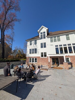 A two-story building with a brick facade and white trim. - Parkway House Goshen Bed & Breakfast Suite #2 (Goshen)