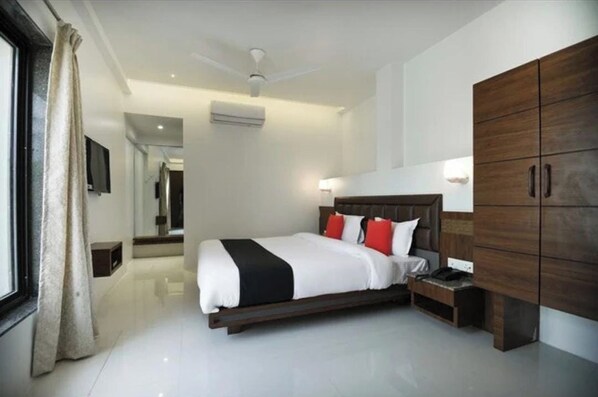 Habitación Deluxe | Escritorio, wifi gratis, ropa de cama