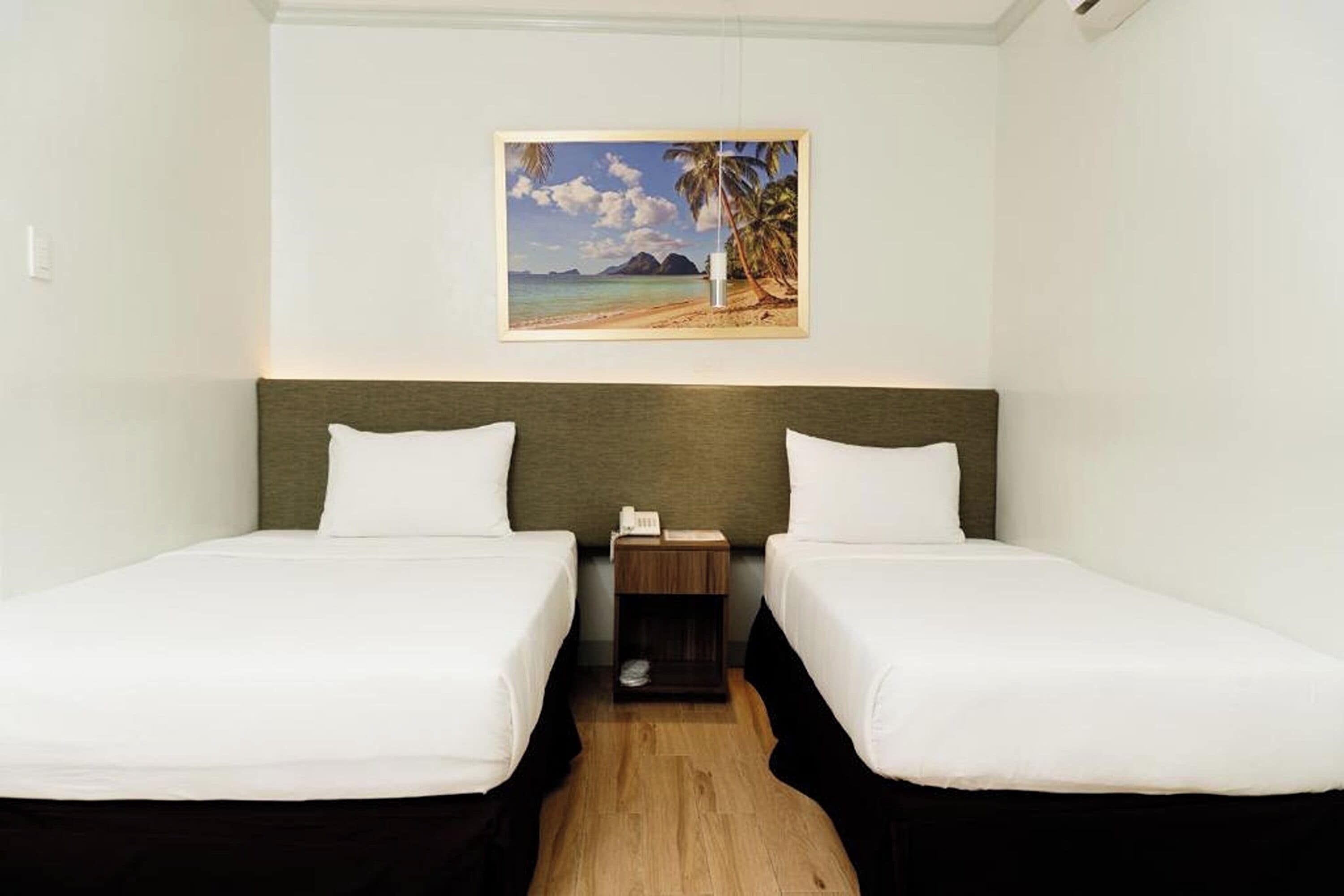 Habitación superior | Escritorio, wifi gratis y ropa de cama 