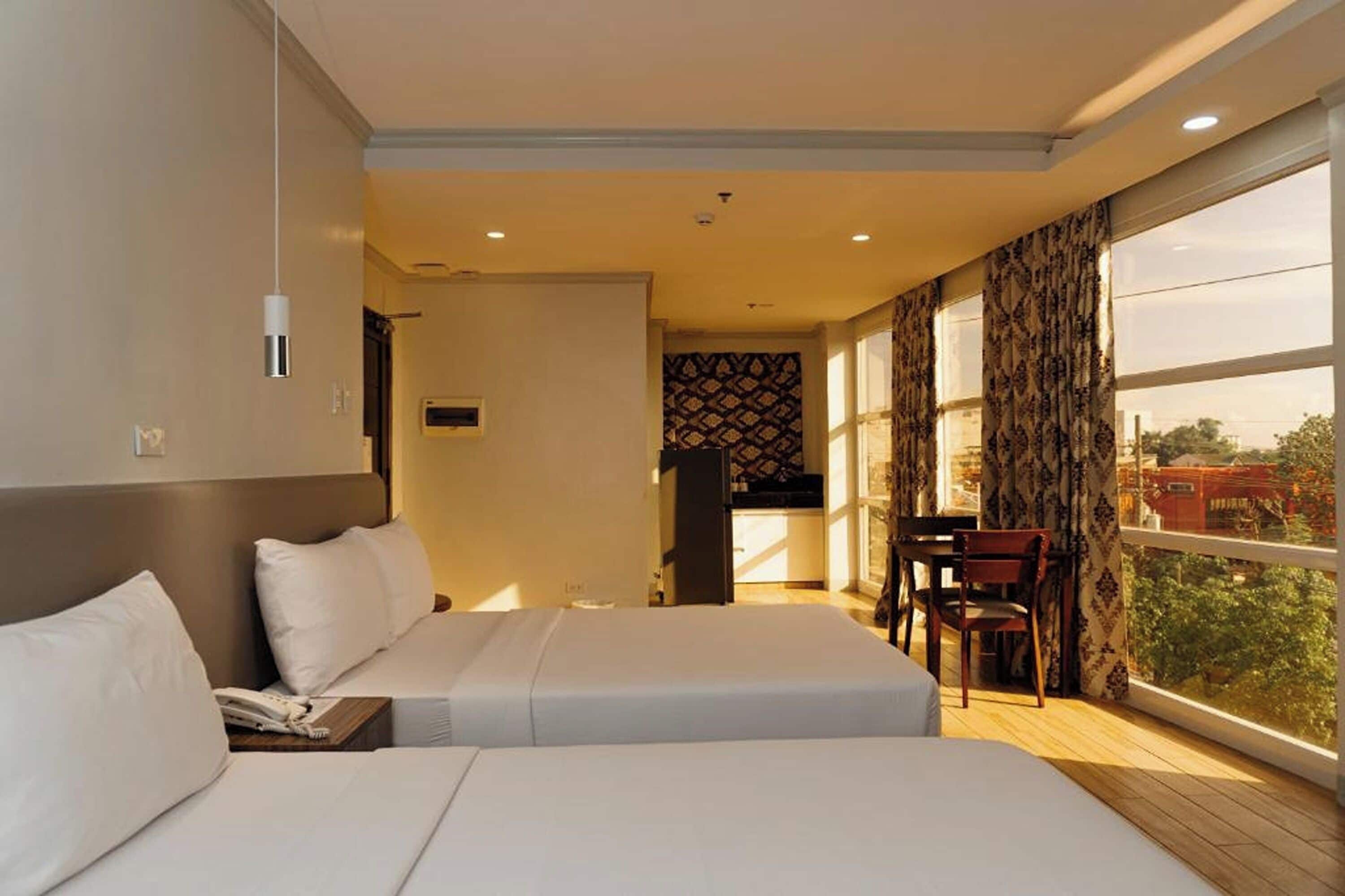 Suite ejecutiva | Escritorio, wifi gratis y ropa de cama 