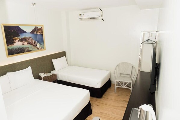 Habitación Deluxe | Escritorio, wifi gratis y ropa de cama 