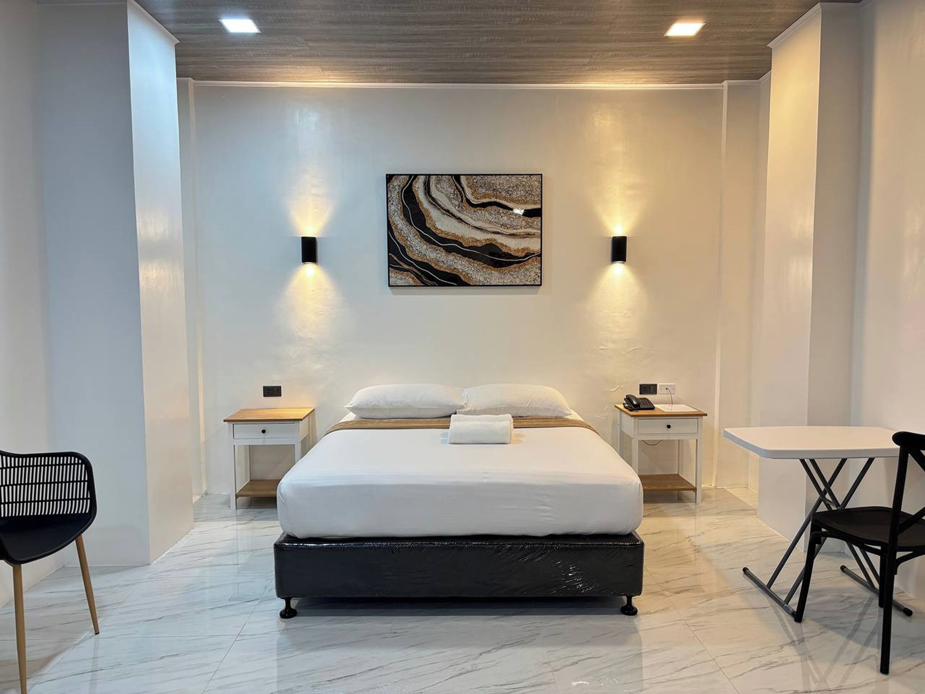 Deluxe kamer, 1 queensize bed | Een bureau, gratis wifi, beddengoed