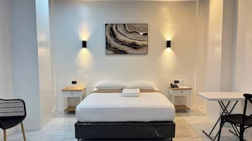 Deluxe kamer, 1 queensize bed | Een bureau, gratis wifi, beddengoed