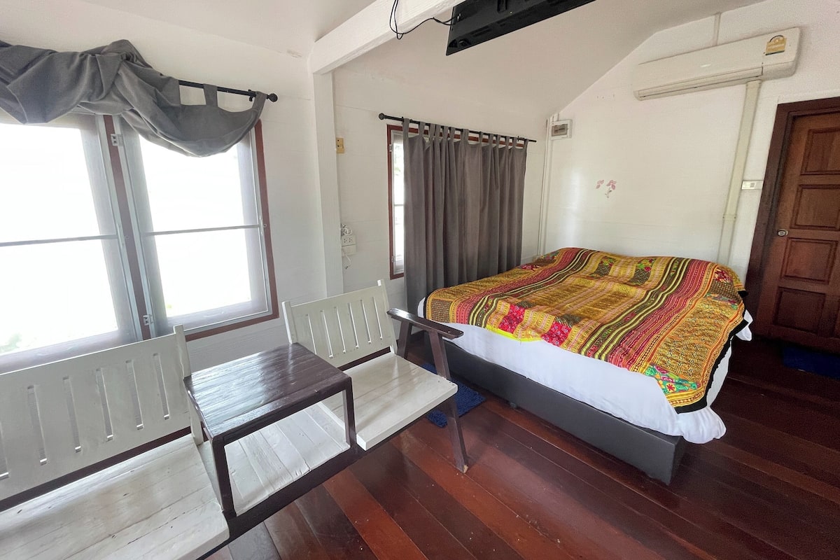 Bungalow, vista al jardín | Ropa de cama