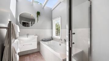 Shower, eco-friendly toiletries, hair dryer, towels
