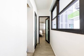 1 bedroom, desk, iron/ironing board, travel crib