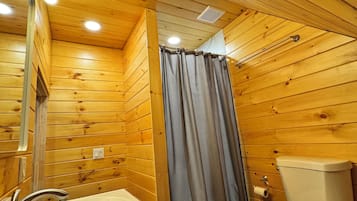 Shower, towels, soap, toilet paper