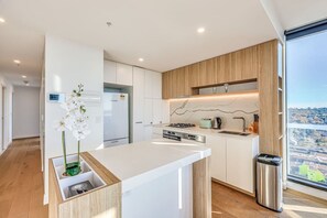 Fridge, microwave, oven, stovetop - StayAU Bright Modern Prime Penthouse in Box Hill (Box Hill)