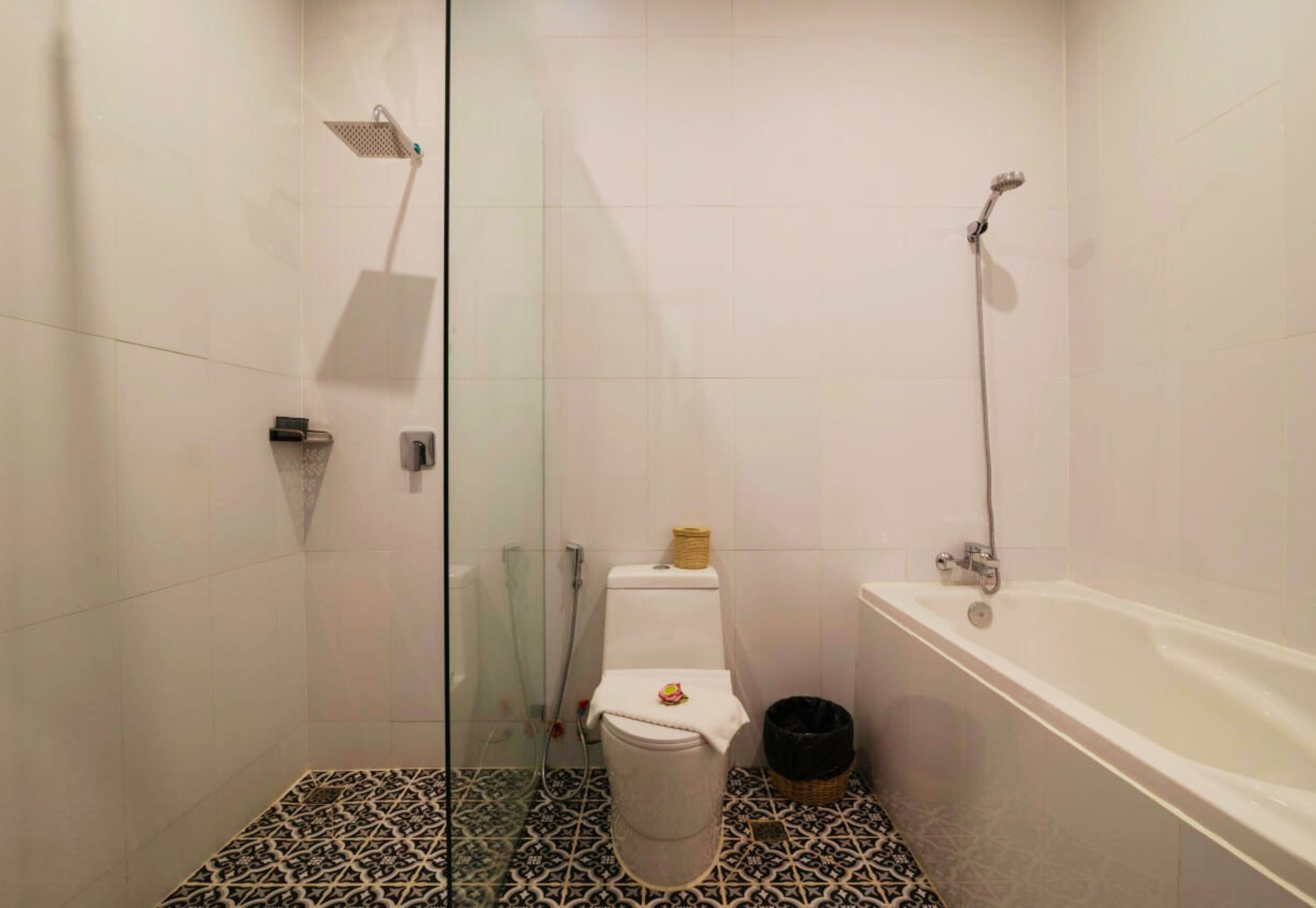 Separate tub and shower, rainfall showerhead, free toiletries